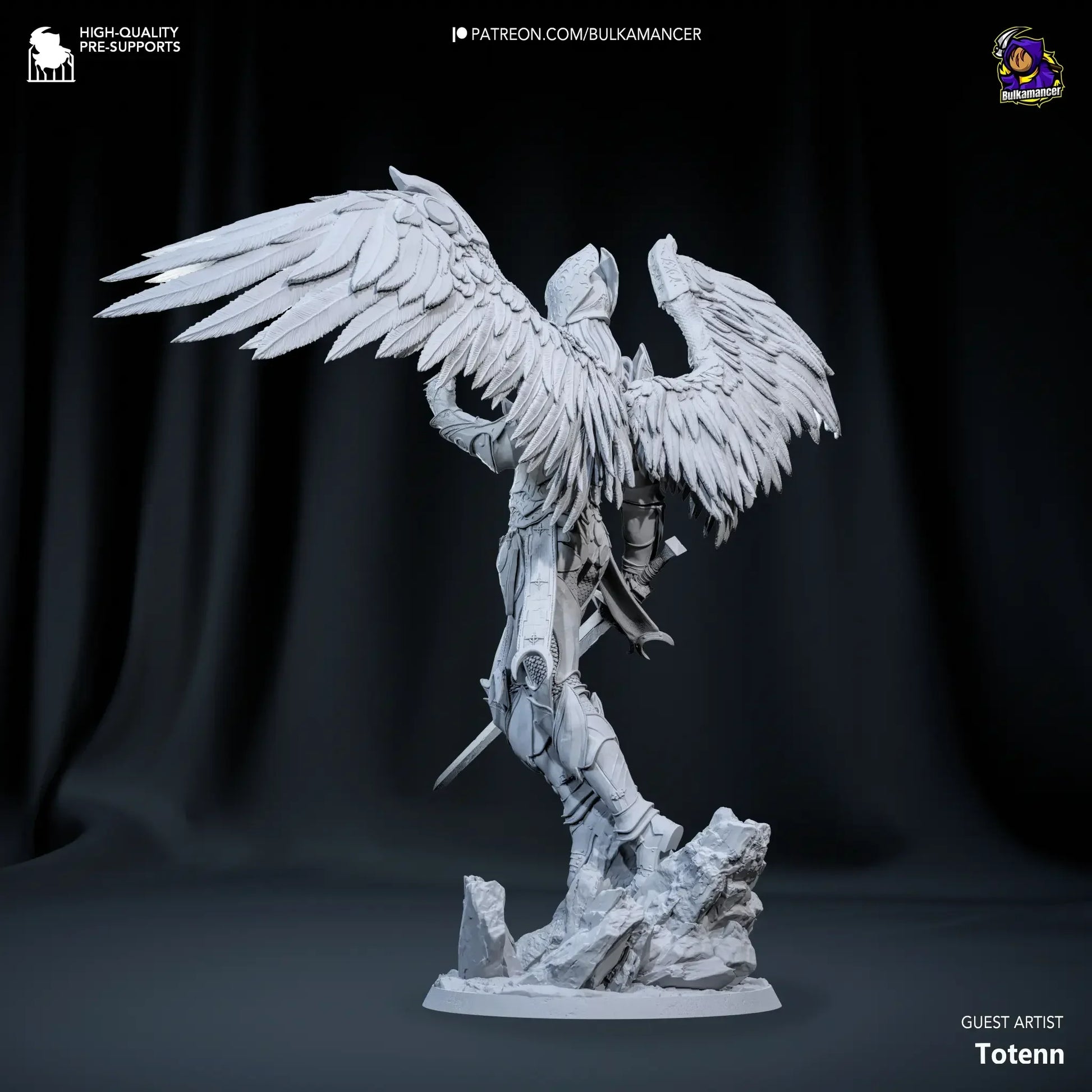White resin figurine of a winged creature on a dark background