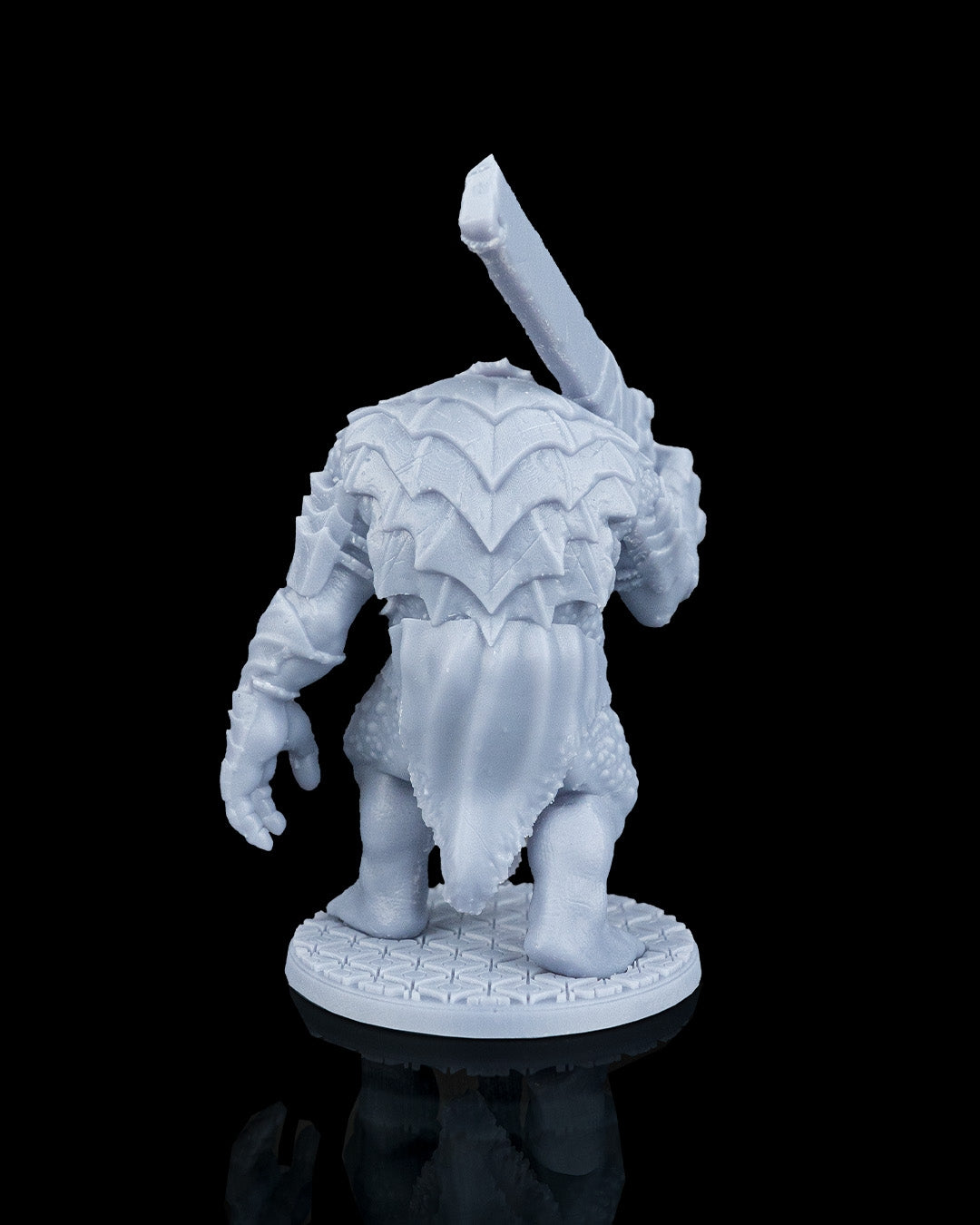 Rear view of Slasha the Troll resin miniature highlighting his heavy shell-like spiked carapace armor plates.
