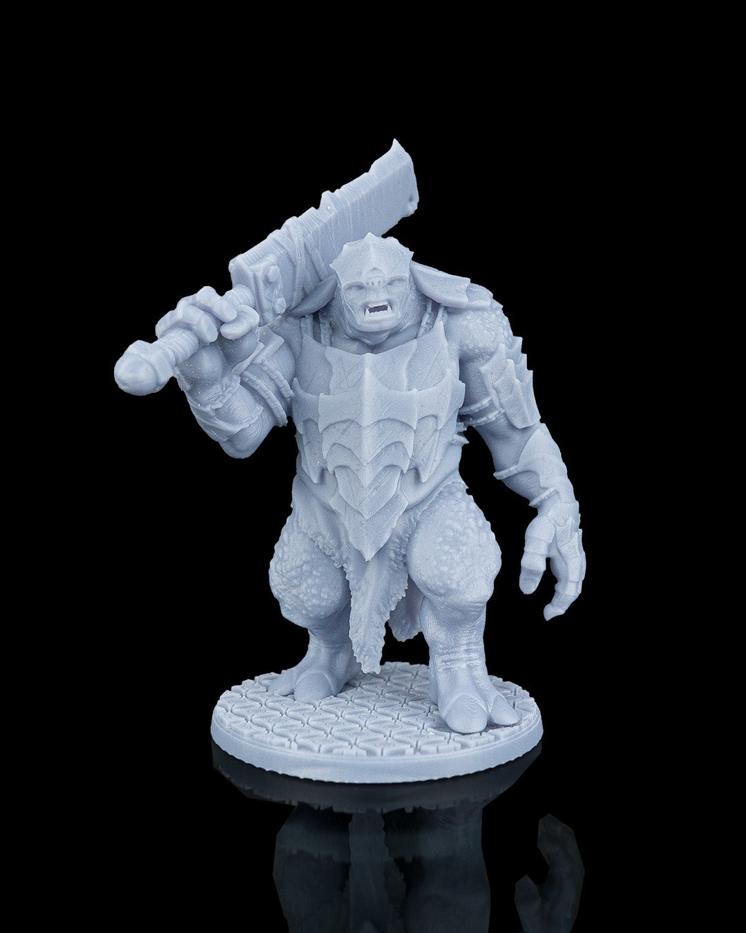 Slasha the Troll monstrous giant resin miniature by Artificers Mini standing forward in heavy plate armor with a greatsword.