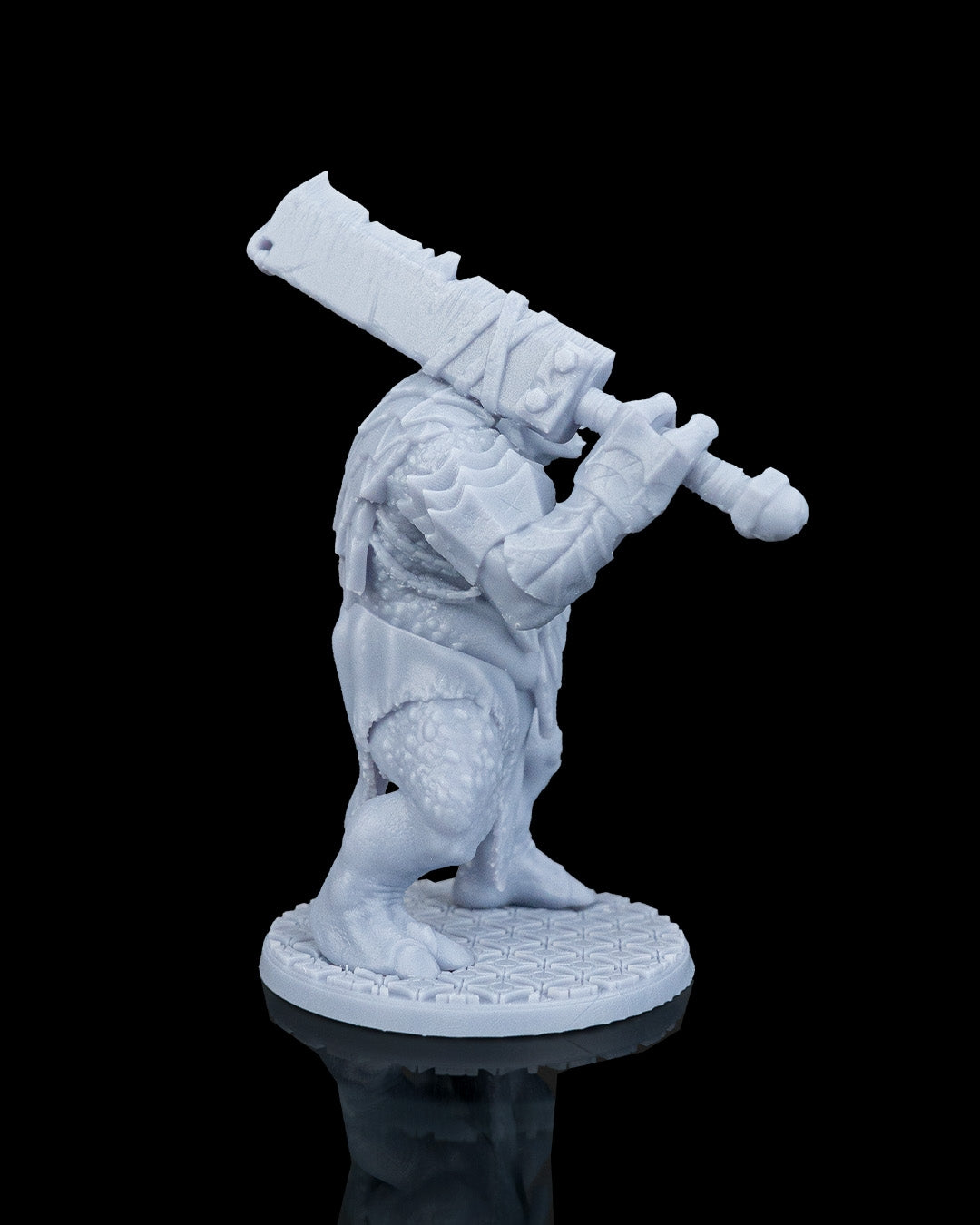 Right profile view of Slasha the Troll mini showing the massive executioner-style blade resting on his shoulder.