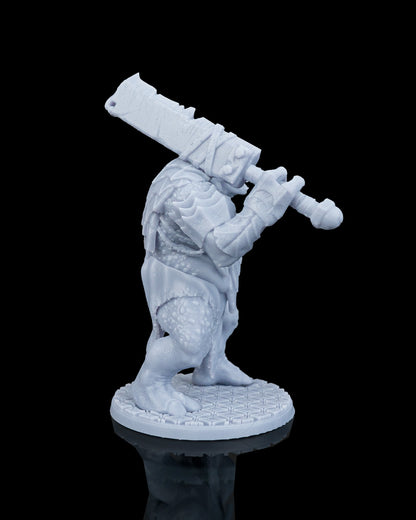 Right profile view of Slasha the Troll mini showing the massive executioner-style blade resting on his shoulder.