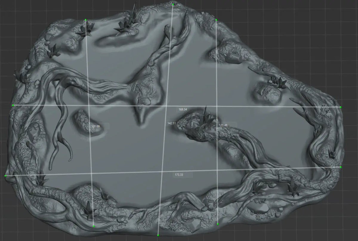 Slicer measurement view of the swamp scatter terrain base highlighting dimensional scale grid in millimeters.