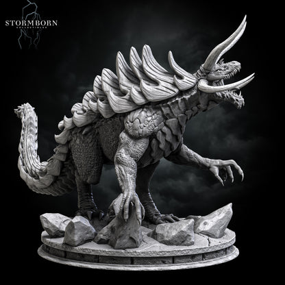 Right side view of the Tarrasque miniature showcasing its claws, armored tail, and muscular legs by Stormborn Collectibles.