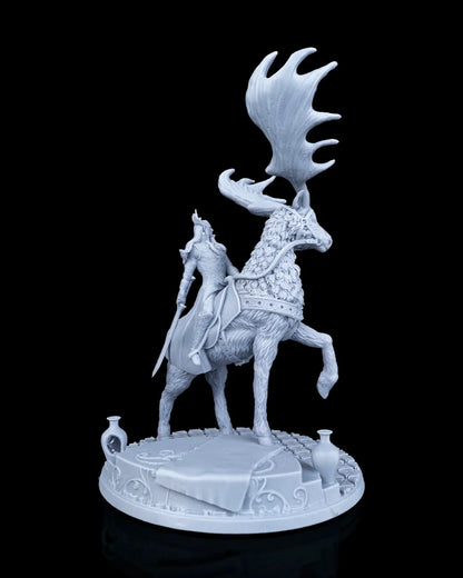 Right side view of the mounted elf miniature showing the huge sweeping elk antlers and the rider holding a long elven sword down at his side.