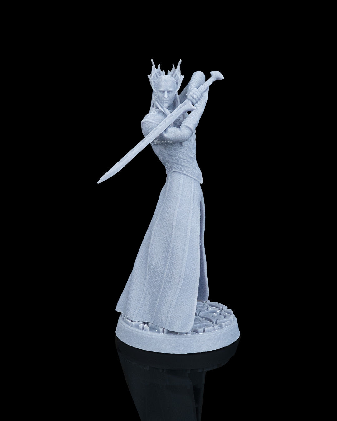 Direct front view of the unpainted elven king model looking forward while gripping his longsword over his shoulder.