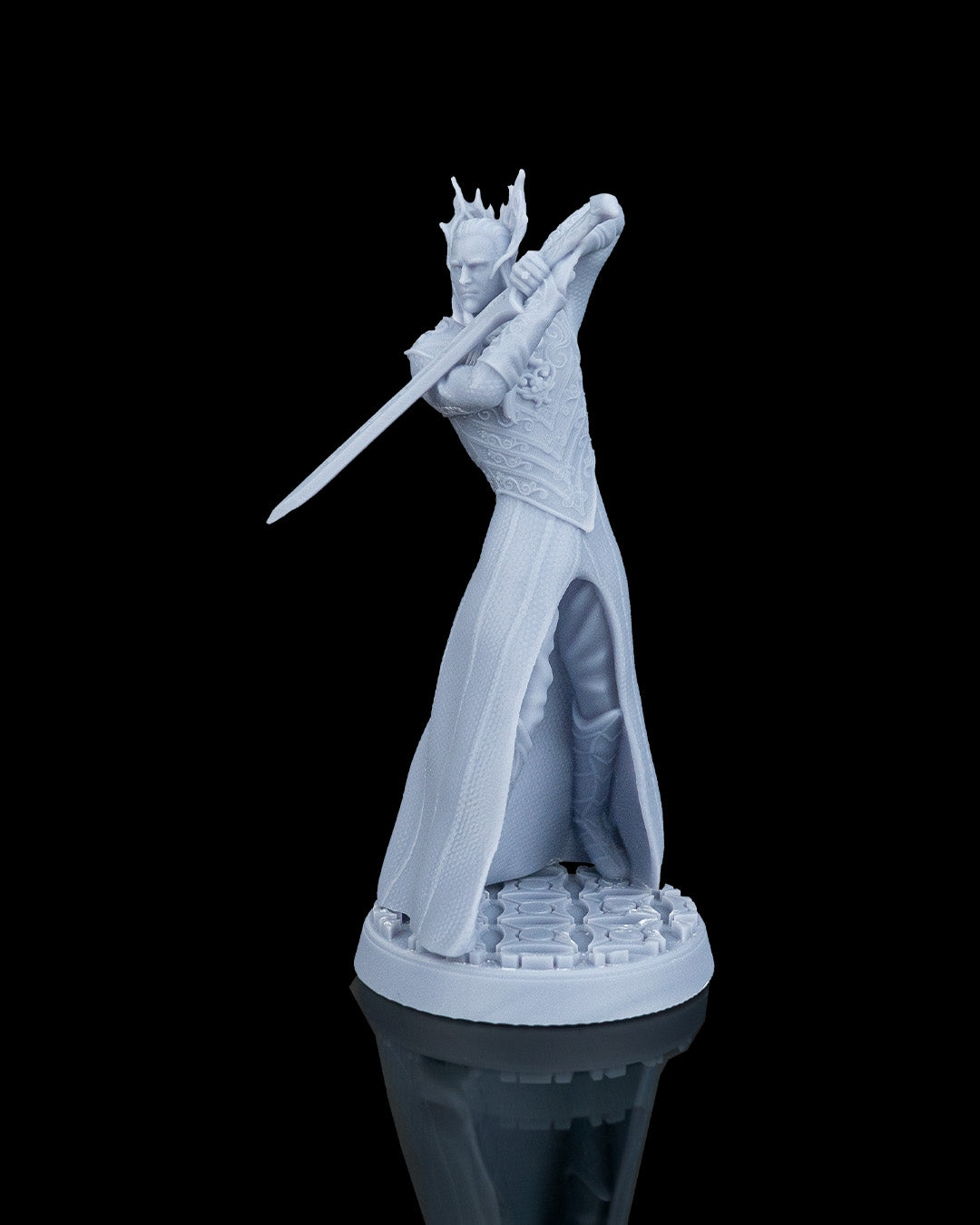 Three-quarter front view of the unpainted resin miniature The Silver King, an elven lord with a crown drawing a longsword on a paved base.