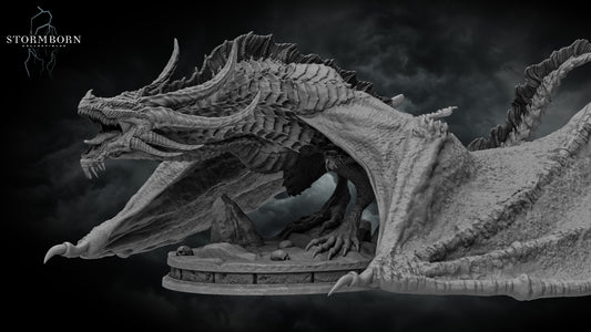Three-quarter view of the Thornscale Dragon resin miniature showing its gaping jaw and massive wingspan by Stormborn Collectibles.