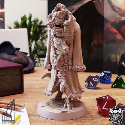 Three Kobolds in a Trenchcoat miniature by Dungeon Dog showing three kobold heads beneath a fur-trimmed coat.
