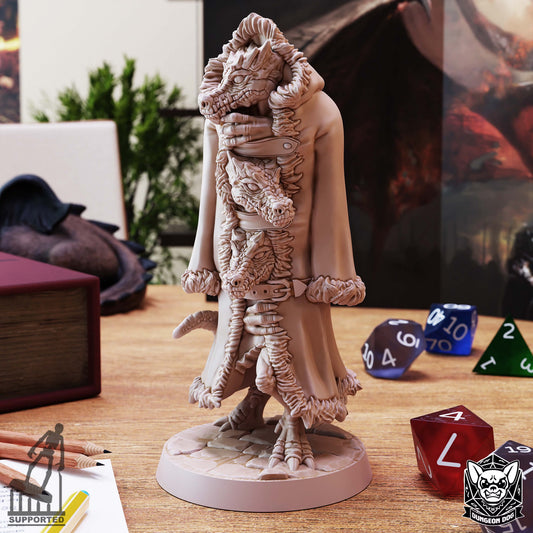 Three Kobolds in a Trenchcoat miniature by Dungeon Dog showing three kobold heads beneath a fur-trimmed coat.