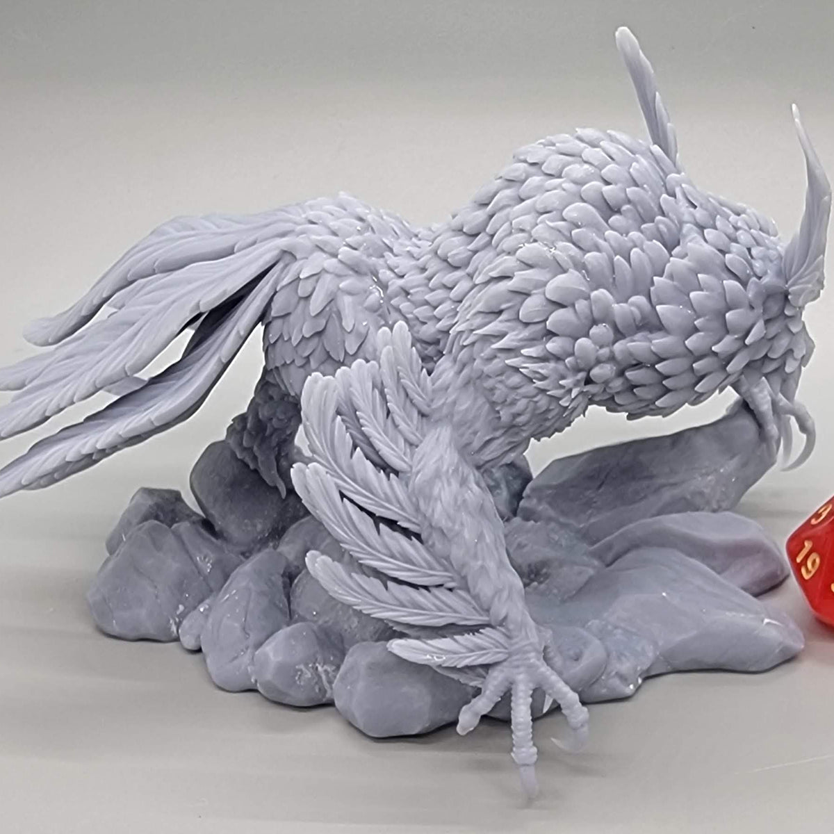 Side perspective of the printed Titancrest Owlbear resin miniature showing body plumage by Stormborn Collectibles.