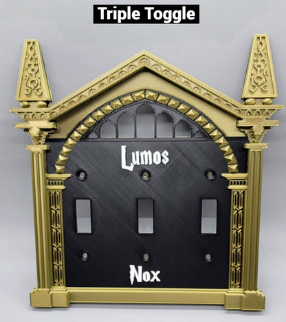 Triple toggle wizard light switch cover with bronze frame, black plate, and white Lumos and Nox lettering for wall plate decor