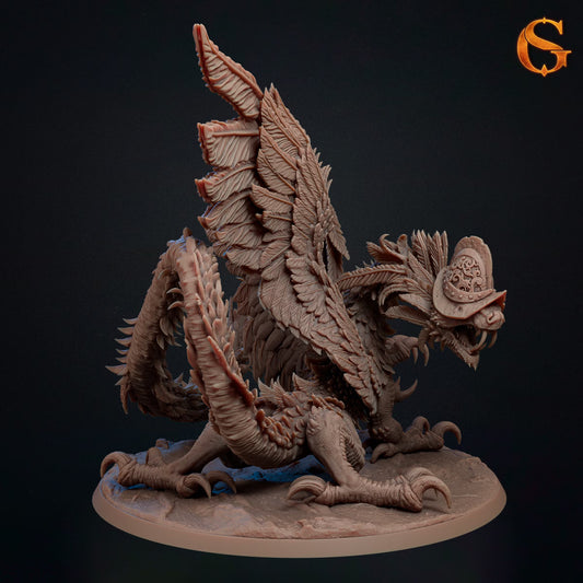 Rear view of Triucoatl feathered dragon miniature showing layered wings and coiling feathered tail