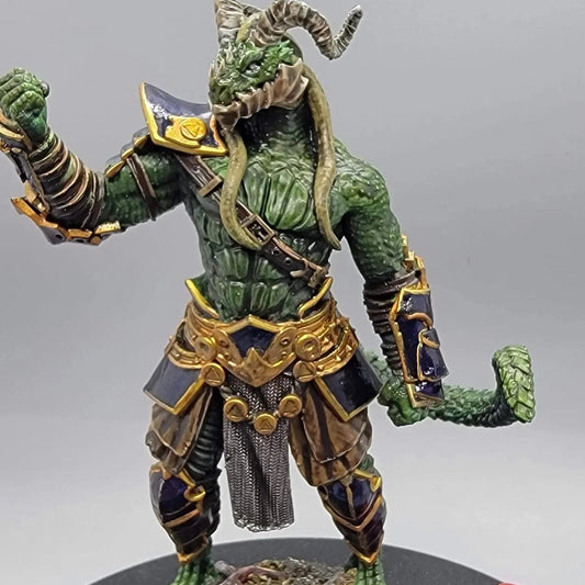 Painted 75mm variant of Vaakrin Steeljaw resin miniature with a highly detailed scenic base and scale die for TTRPG games