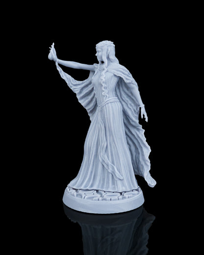 Left side profile view of the Valyra miniature showing her long pointed elf ear, delicate tiara detail, and the intricate ripples along her drapery.
