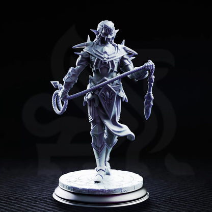 Front view of Vessels of Irinax Drow Soldier 3 carrying a bladed whip while wearing a mask and heavy spider-themed armor
