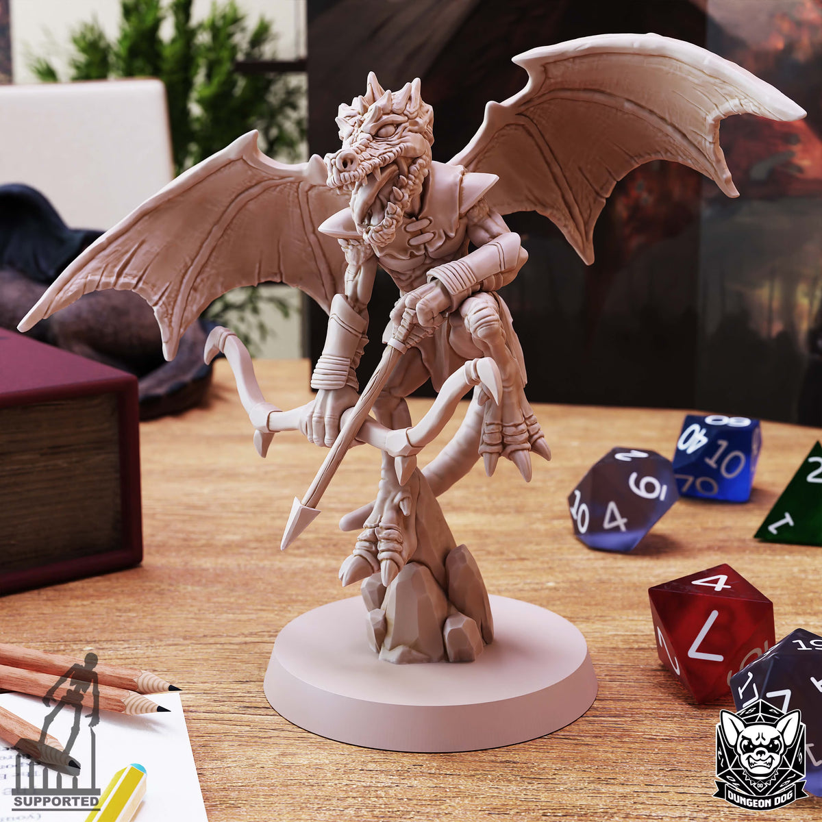 Winged Kobold Bow miniature by Dungeon Dog holding a bow and arrow with wings extended above rocky terrain.