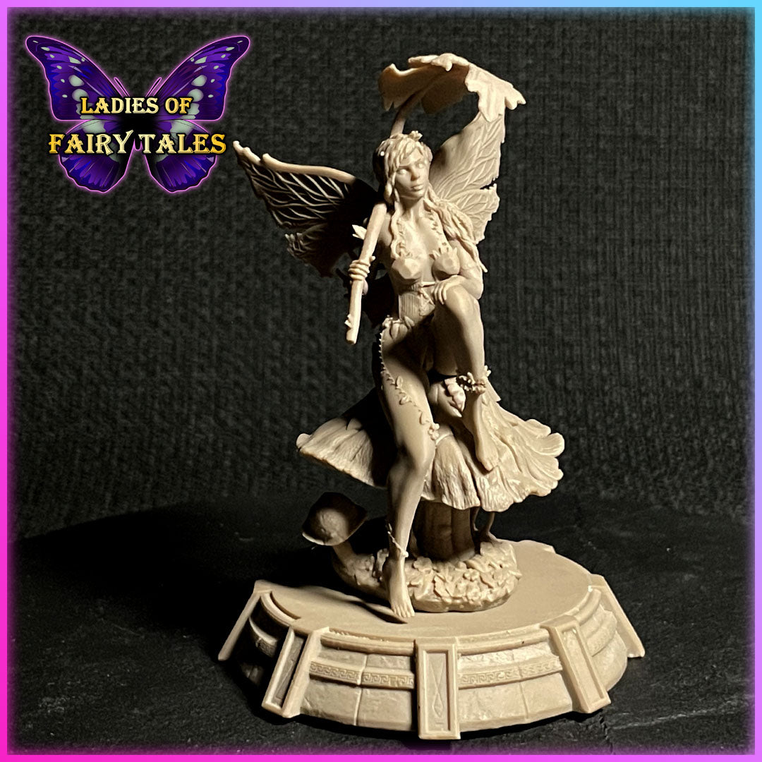 Physical 3D print photo of Ydsel fairy maiden miniature sitting on a mushroom with a leaf umbrella.